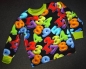 Jersey digitalprint farvede tal på sort baggrund