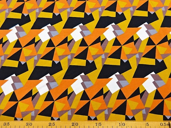 Jersey Rotationsdruck Grafik gelbe Dreiecke schwarz orange weiß