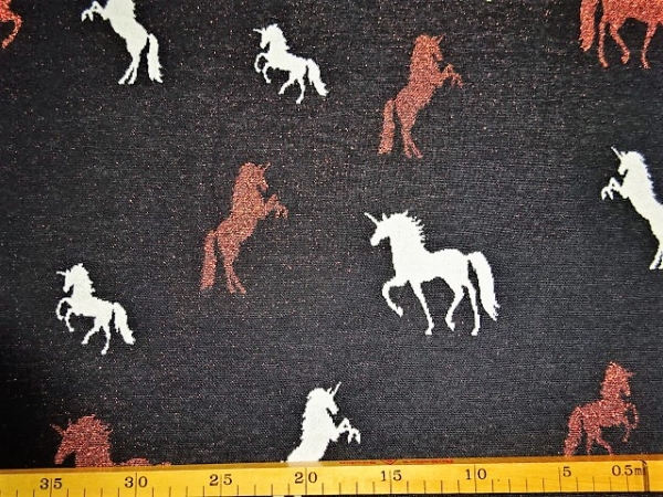 Baumwollstrick mit Lurex goldglitzernd auf schwarz Einhorn